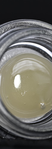 Pale yellow cannabis concentrate in jar