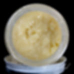 Open jar of crumbly yellow cannabis concentrate with Silver Creek text.