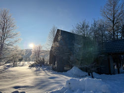 Cabaña Alpina en invierno