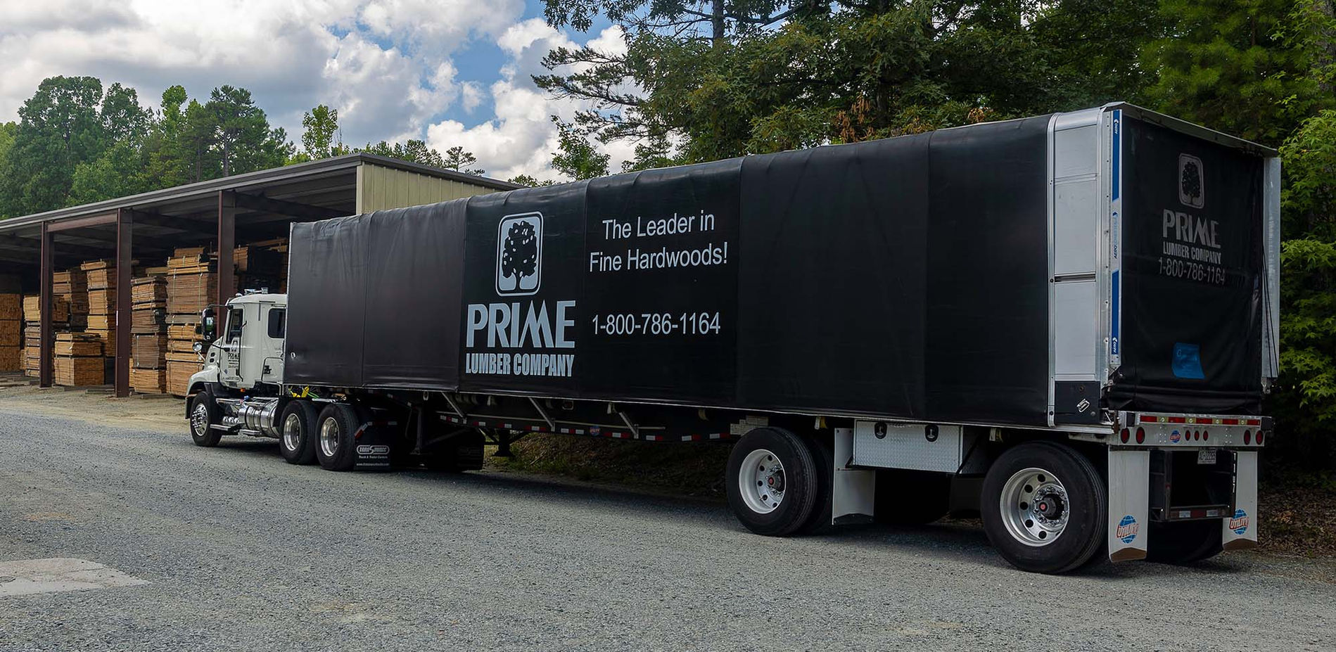 One of our trucks owned and operated by Prime Lumber Transport, Inc.