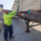 Beard Hardwoods employee loading a truck with hardwood lumber.