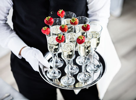 Waiter Standing With Champagne Glasses N