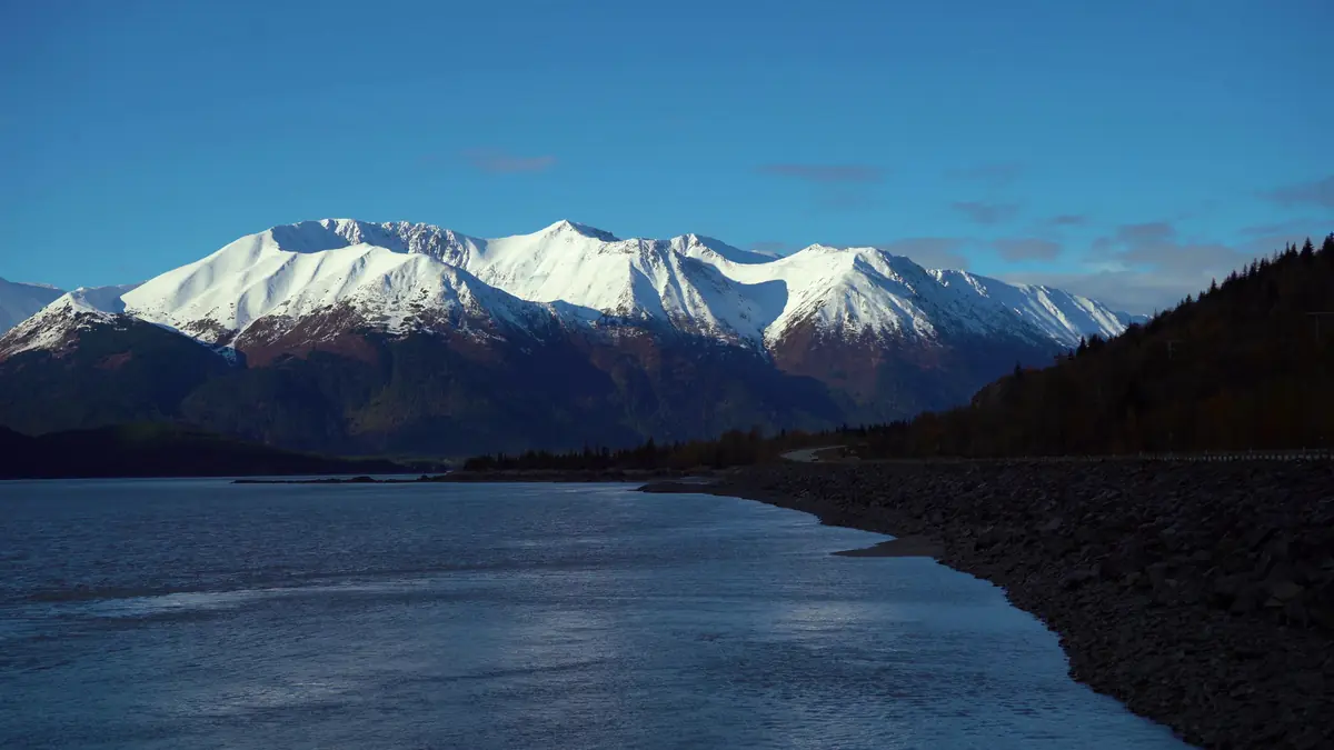 Snow-capped mountains beside Turnagain Arm and the Seward Highway in Alaska