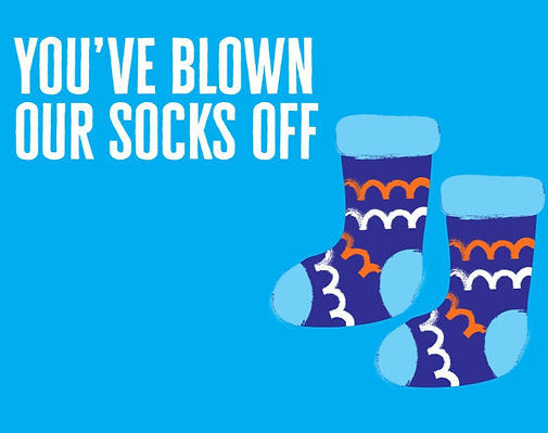 A postcard from Diabetes UK, saying "you've blown our socks off" - with a pair of blue socks on.