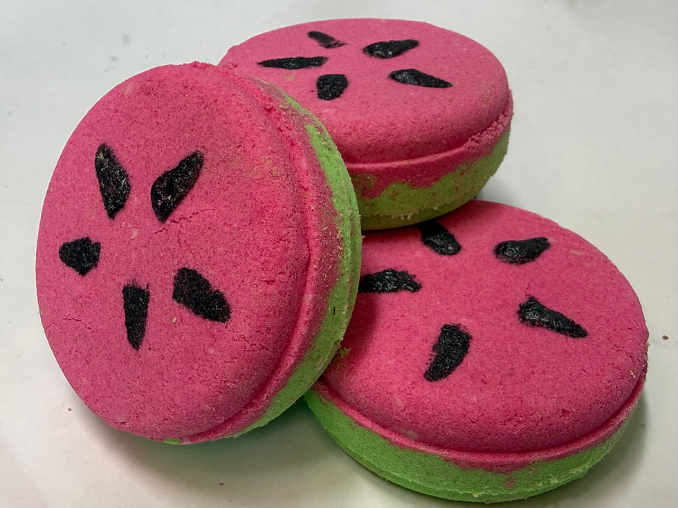 Pink and green watermelon bath bombs with painted seeds