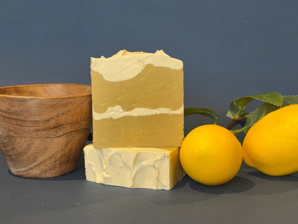 Butter yellow and cream colored soap bar fashioned after a chiffon cake with orange and lemon citrus notes