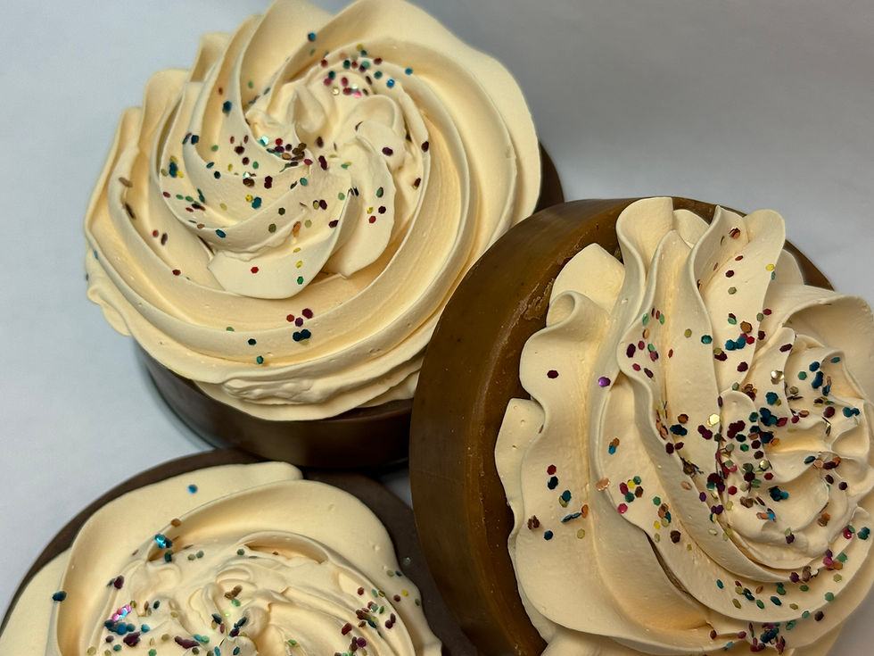 Biodegradable Glitter topping a frosted brownie shaped soap bar scented with brownie fragrance