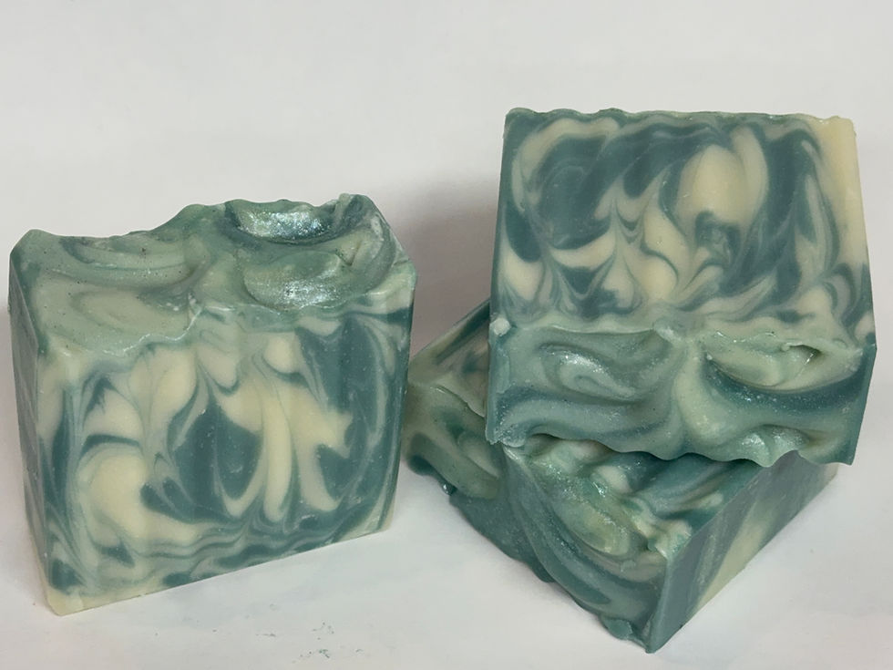 Green and white swirled soap scented with cucumber and mint