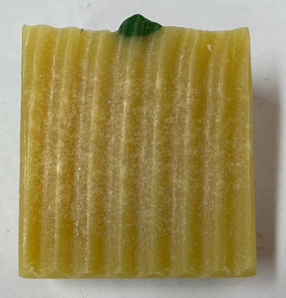 Lemon yellow soap bar with green piping