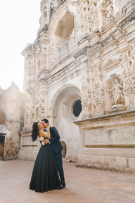 A couple dancing in front of the Ruins of Santa Clara in Antigua Guatemala. Luxury weddings in Guatemala.