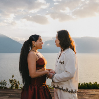 A couple gazing intently at each other during an engagement ceremony at Casa Palopó in Atitlán, Guatemala. A venue for luxury weddings.