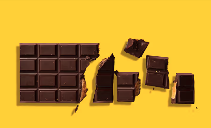 A bunch of differnt types of chocolate w/ different cocoa percent made farm to bar