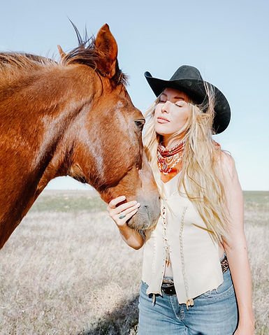 Owner holding Horse