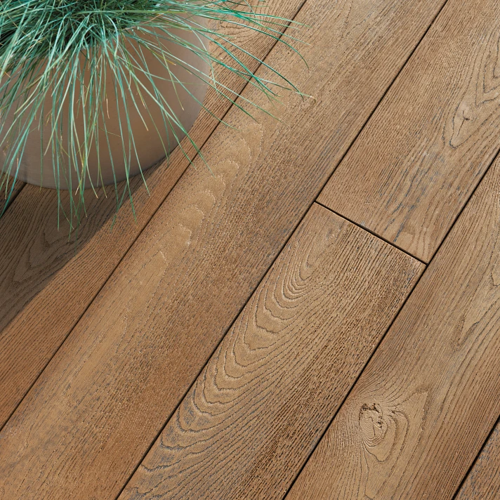 Terrasse extérieure en lames Millboard coloris chêne antique avec pot décoratif, design haut de gamme.