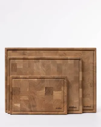 Trois planches WOODSTONE (S, M, L) alignées pour comparaison de tailles.