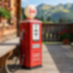 Station essence Baghera vintage rouge sur une terrasse en bois avec vue montagne