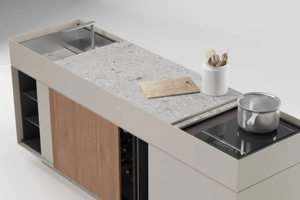 Cuisine extérieure modulable avec plan de travail en pierre, évier, plaques de cuisson et rangements, conçue pour une utilisation élégante et optimisée en plein air