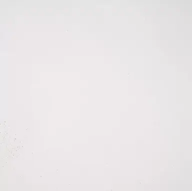 Échantillon de finition Cemento Pearl – texture du plateau en béton clair de la table Eidos.