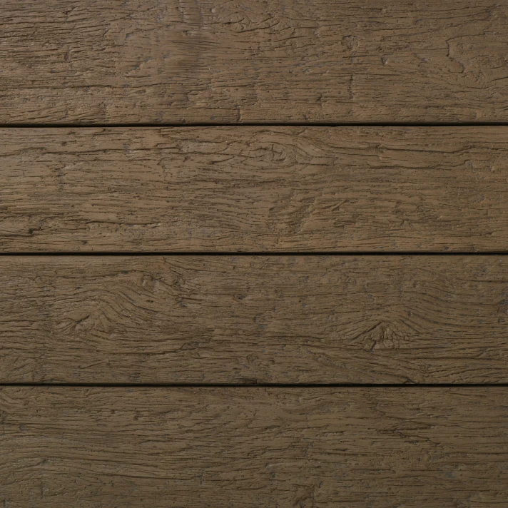 Texture authentique des lames Millboard Weathered Oak Vintage, finition bois patiné pour aménagements extérieurs élégants et durables