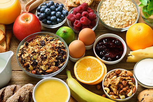 healthy-breakfast-ingredients-food-frame-granola-egg-nuts-fruits-berries-toast-milk-yogurt