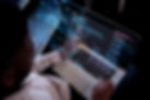 programming-background-with-person-working-with-codes-computer.jpg