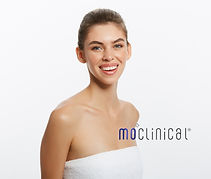 image of a lady putting on a towel reaching her chest