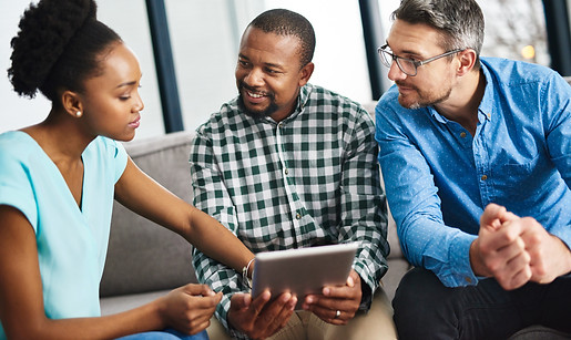 office-meeting-people-with-tablet-discussion-investment-feedback-progress-growth-happy-inv