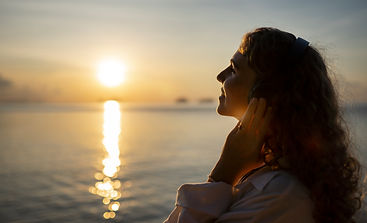 medium-shot-woman-spending-day-alone-beach.jpg