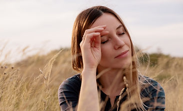portrait-lovely-young-woman-relaxing-field.jpg