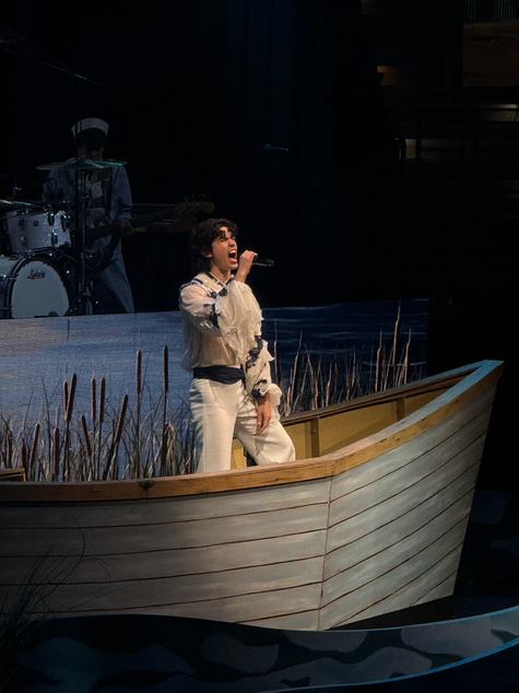 Conan Gray in a Boat