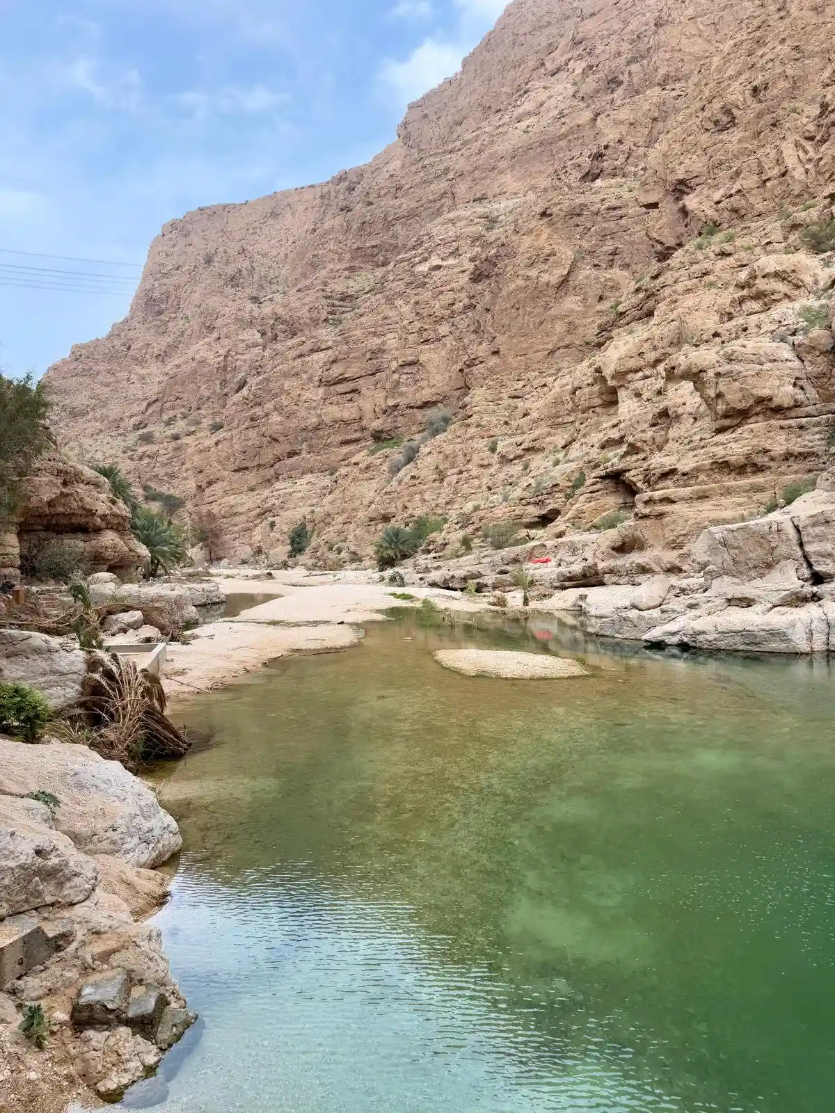 Gorges falaises ocre bassin turquoise Wadi Shab Oman