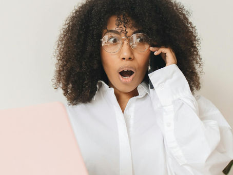 A Black woman cleaning business owner surprised at the mistakes of new cleaning business owners