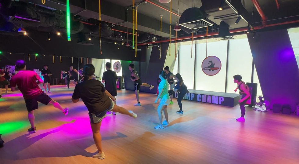 classmates enjoying les mills bodycombat class in chimpchamp fitness tanjong pagar