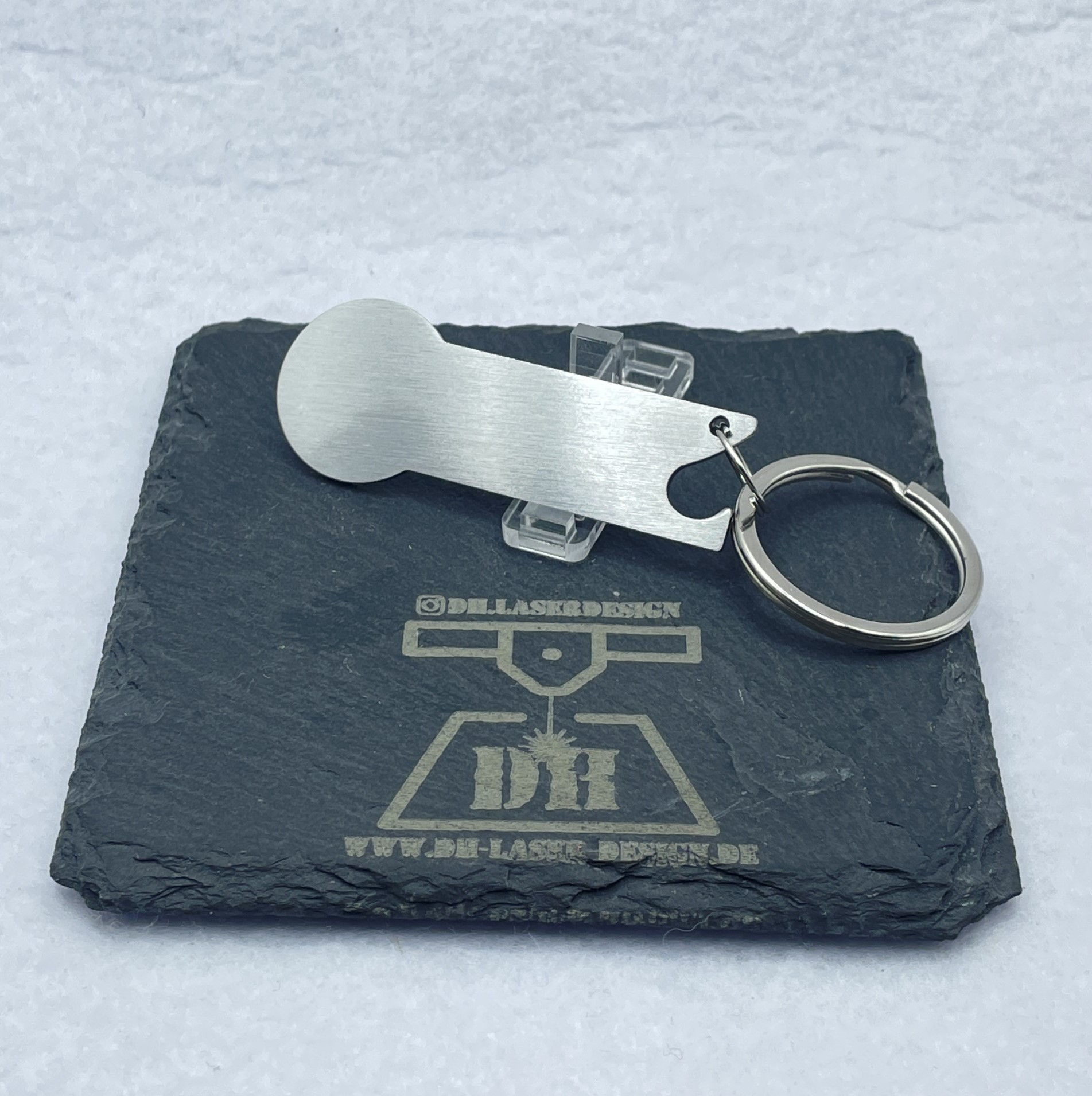 Einkaufswagenlöser mit Flaschenöffner