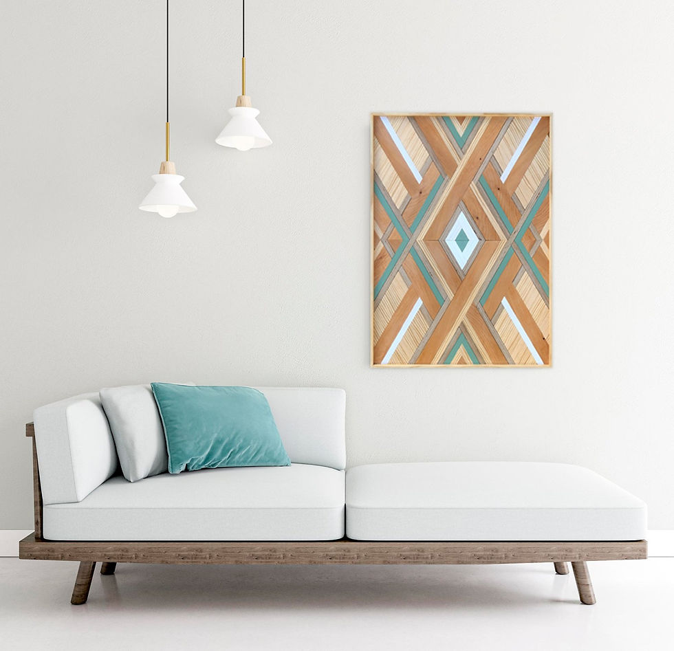 A minimalist living space with a wooden-framed geometric artwork in earthy tones on the wall, a light blue cushioned sofa with a teal pillow, and two pendant lights.