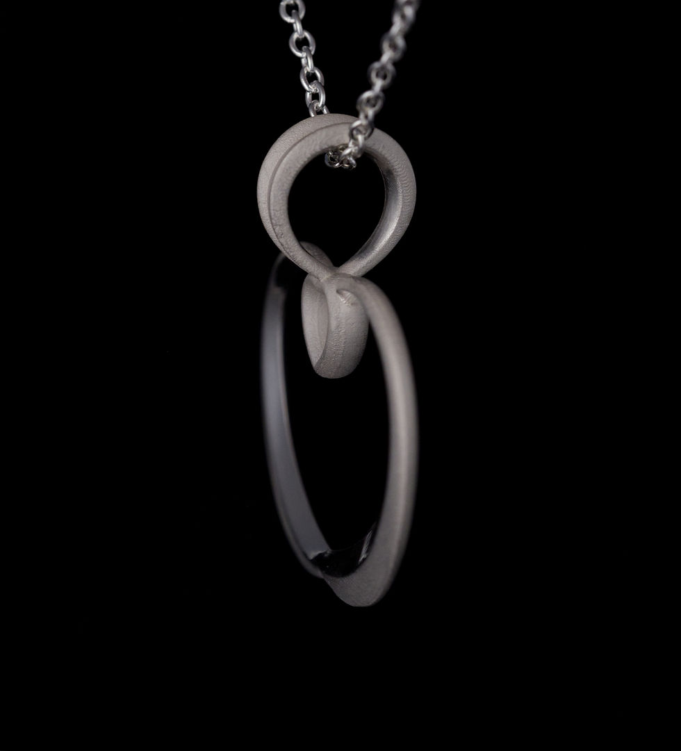 Thumbnail: Royal Rump Corgi Pendant shown at a steep angled view in fine gold.