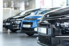 low-angle-of-extravagance-store-with-cars-in-a-row-for-sale.jpg