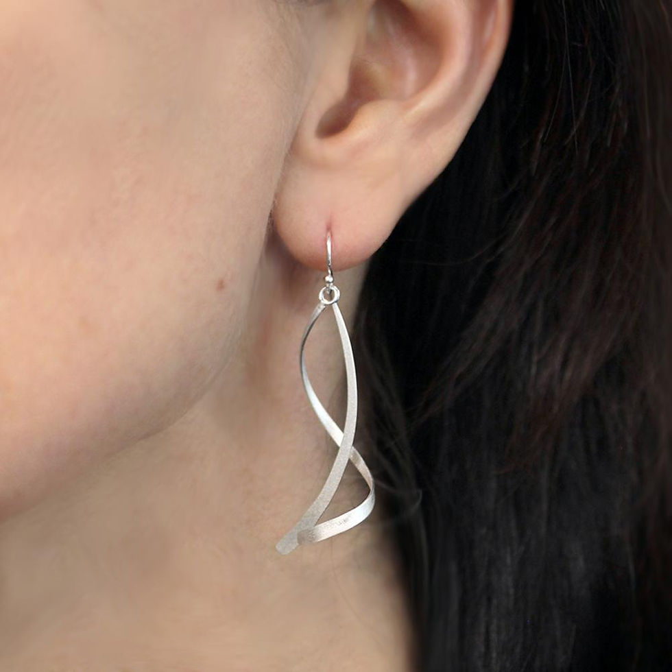 Thumbnail: Twist and Turn Silver Earrings