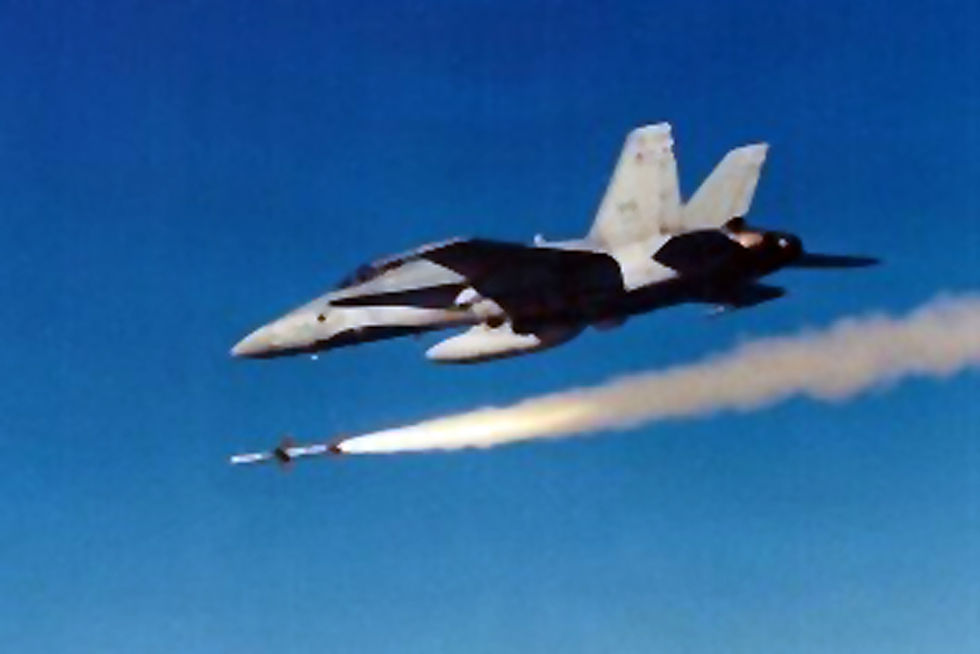 A highlight of Sergeant Beaudoin's career was capturing the first photographs of Canadian CF-18s firing Sparrow missiles over the Gulf of Mexico, shot from the back seat of another CF-18.