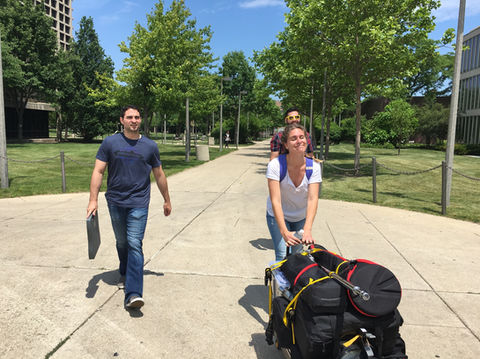 Big Teeth crew walking gear to a shoot
