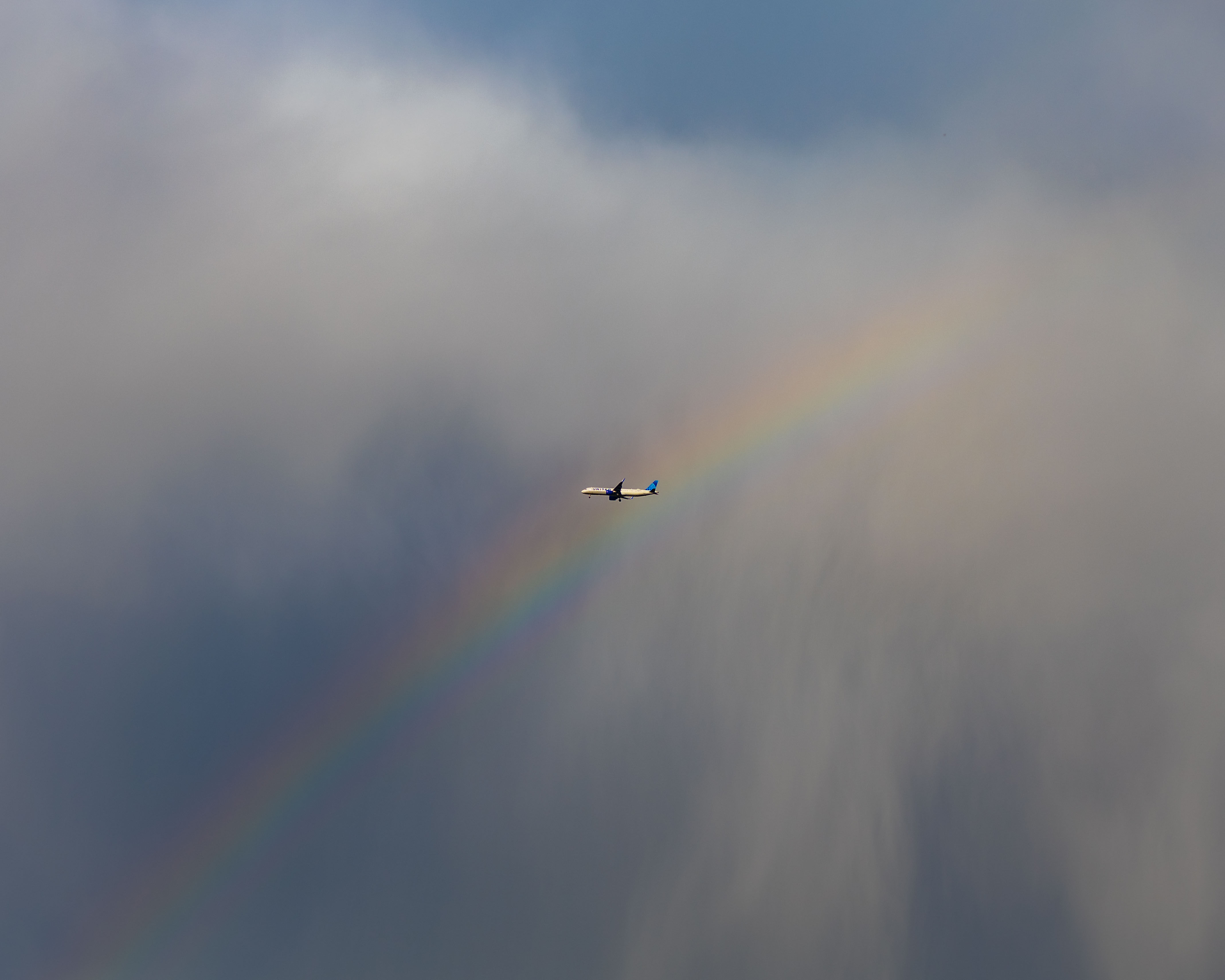 Plane and a Rainbow