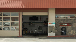 Auto shop with a Pepsi machine 1