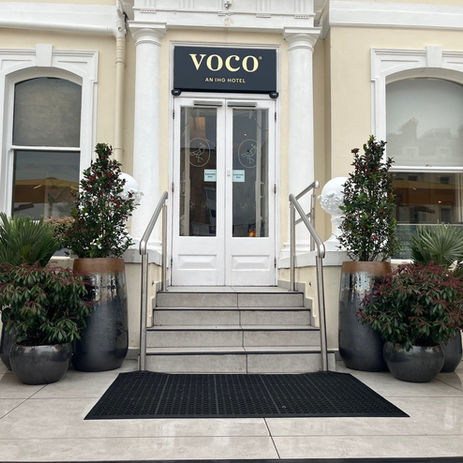 Exterior view of voco™ The Clifton Folkestone, a renovated Victorian hotel overlooking the English Channel, featuring restored architecture and modern design elements