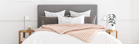 Grey Bed with Quilt