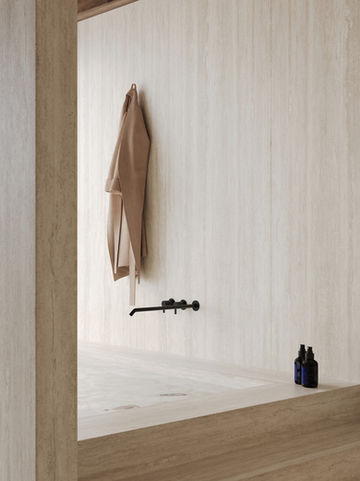 Bathroom Cladding in Travertino Classico natural textured stintered stone