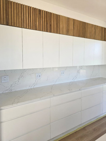 ProQuartz Calacatta Mist Kitchen island countertop and splash back