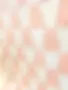close up of longarm quilted pink and white quilt