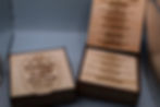 shows a pair of whiskey smoker kits one closed one open showing the engraved recopies 