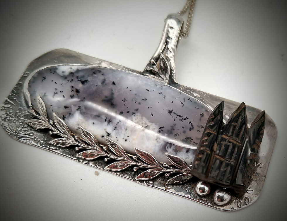 Thumbnail: Carved Whitby Abbey Jet Pendant with Dentritic Opal