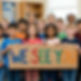 Classroom_children_holding_up__Nano_Banana_2_51308_edited.jpg